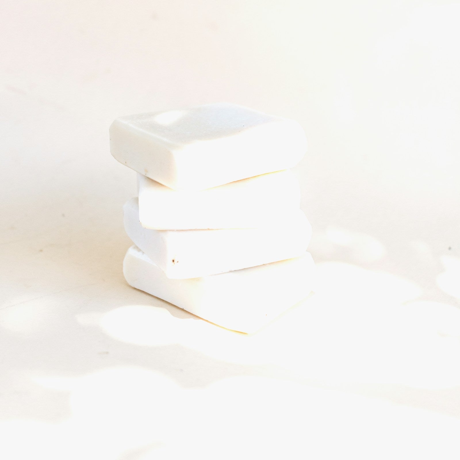Natural dish soap block - solid soap bars stacked, studio white background