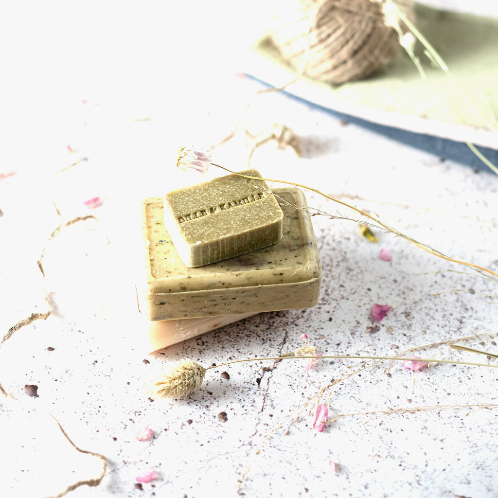Aleppo soap bars with olive and laurel oil on a white background