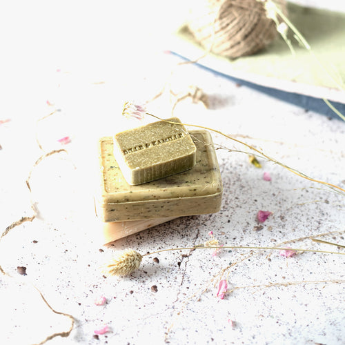 Aleppo soap bars with olive and laurel oil on a white background