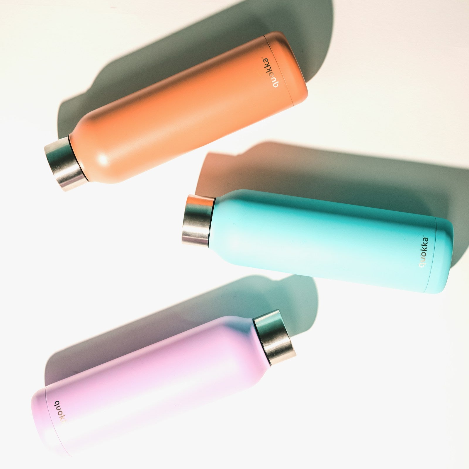 Reusable insulated water bottles on a white studio background