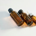 Lavender essential oil in amber glass bottles