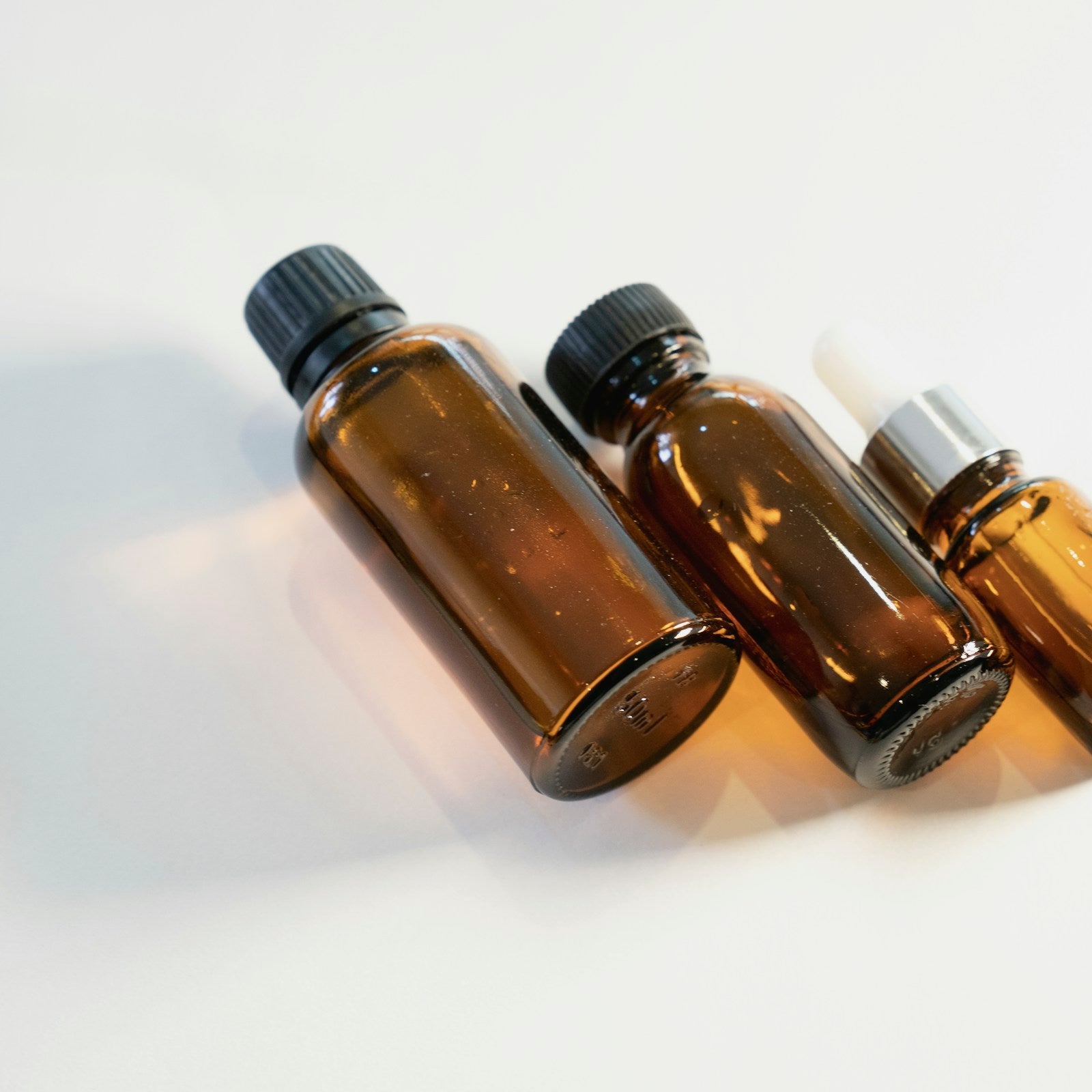 Lavender essential oil in amber glass bottles